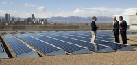 Blake Jones, BE’96 (left), discusses solar energy with Vice President Joseph Biden and President Barack Obama.