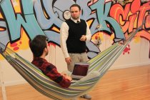 Peter Simon has the best seat in the house, a hammock he's set up every place he's worked.
