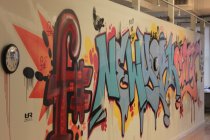 The mural Simon was sitting in front of reps F#'s New York City base.